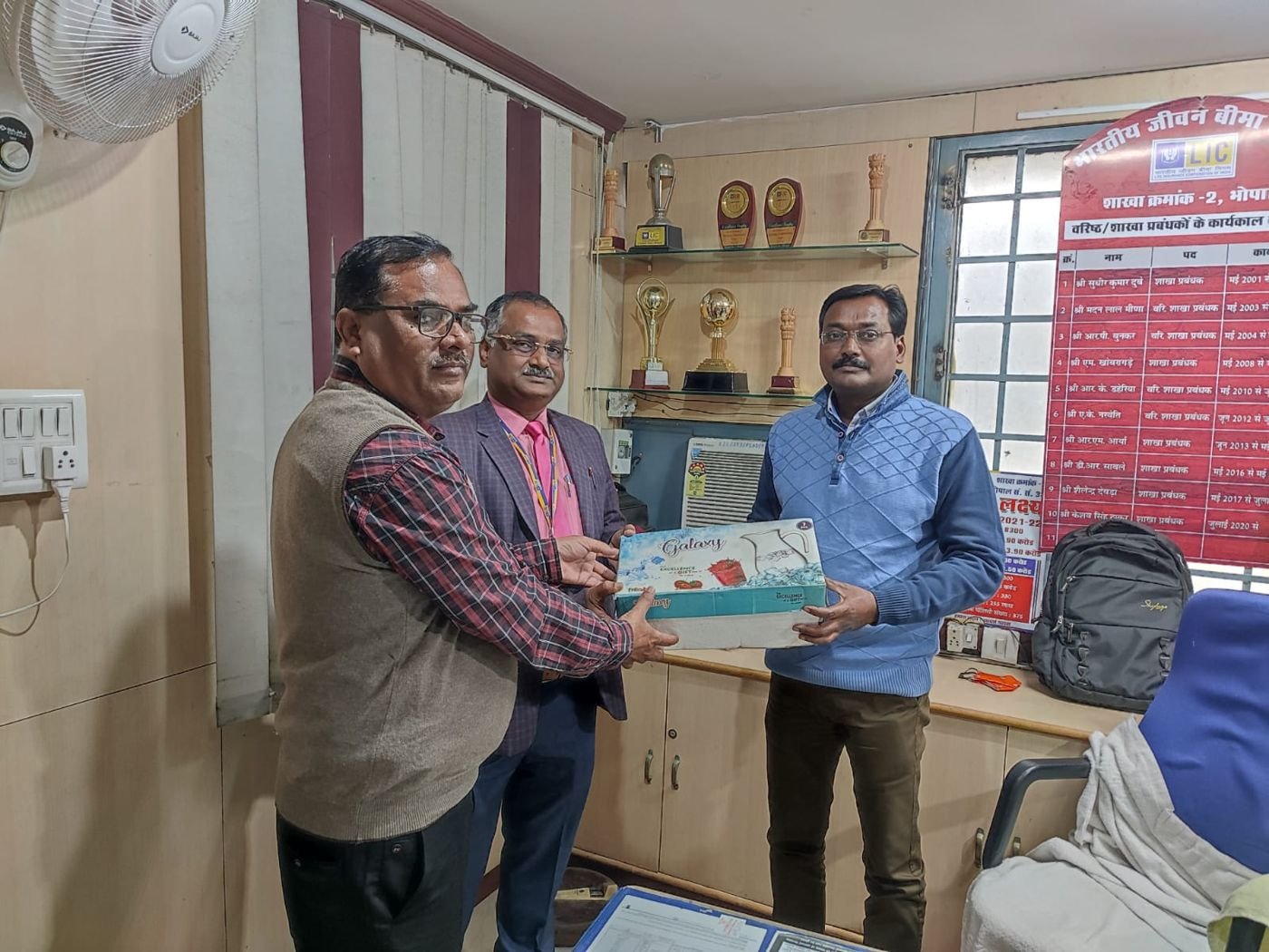 Recognition ceremony with RAH Associates team