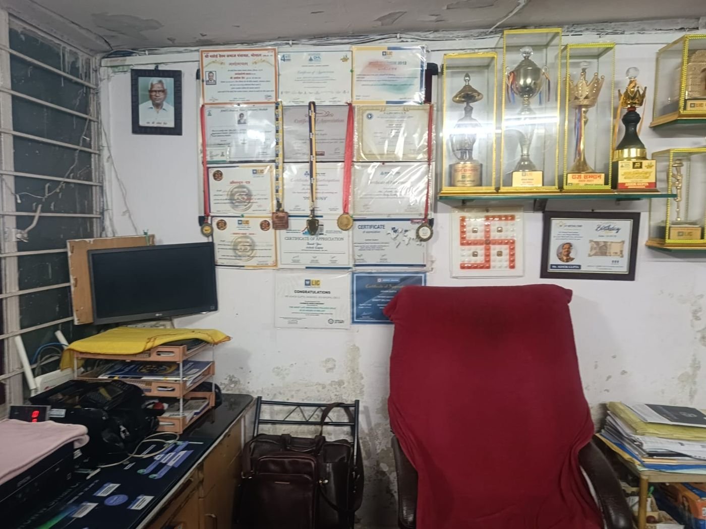 Office desk with certificates